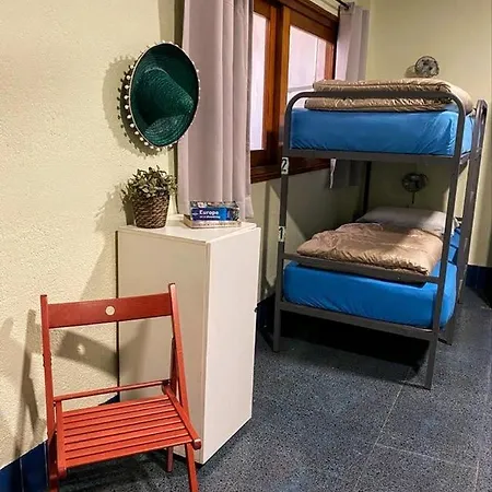 X Hostal